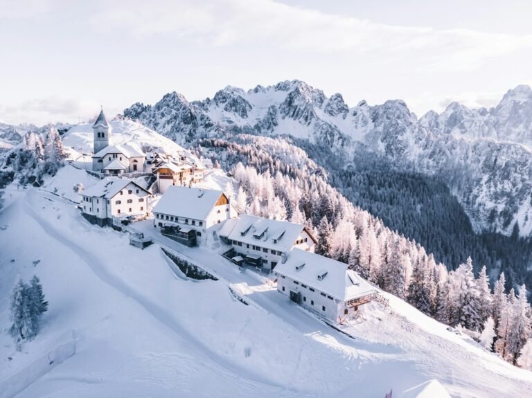 Snow-covered mountain village beneath the Julian Alps